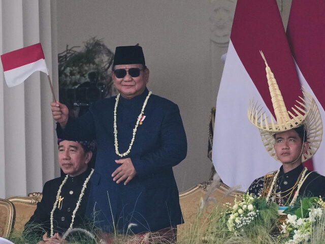Indonesia Independence Day Prabowo Subianto Indonesian President Prabowo Subianto, center, waves national Red-White flag as Vice Presi