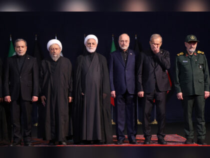 Iranian Foreign Minister Abbas Araghchi (L), Expediency Discernment Council Chairman Sadeq