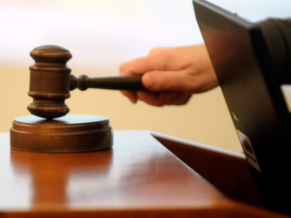 The gavel cracks on a foreclosure sale in the Public Trustees offices at the Wellington We