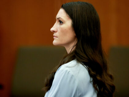 Lindsay Clancy listens to testimony during her murder trial at Plymouth Superior Court on