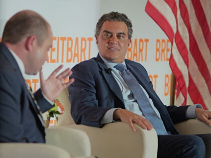 Under Secretary of War Emil Michael speaks with host Matthew Boyle at the Breitbart News E