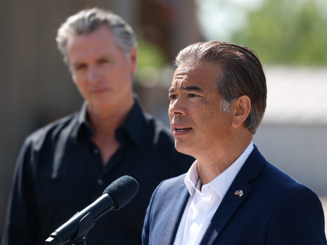 RobBonta CERES, CALIFORNIA - APRIL 16: California Attorney general Rob Bonta (R) speaks as Californ
