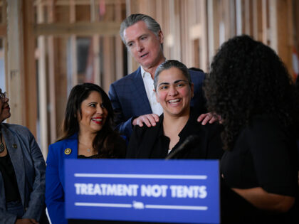 HAYWARD, CA - MARCH 2: Senator Aisha Wahab (C) attends a press conference as Governor Gavi