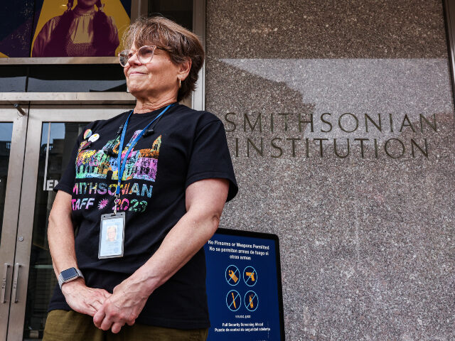 Smithsonian retiree Beth Py-Lieberman, 64, poses for a portrait outside the National Museu