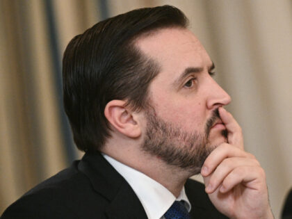 White House Deputy Chief of Staff Taylor Budowich listens during an "Invest America&q