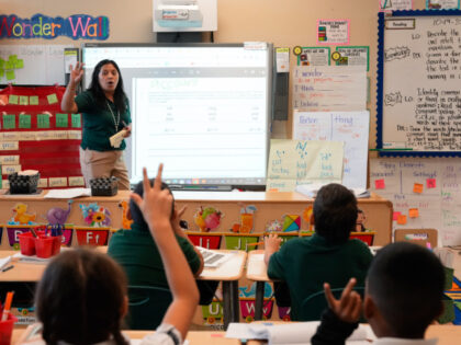 A first-grade Dual Language program teacher is teaching in English on Thursday, Oct. 19, 2
