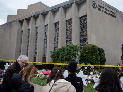 Mourners seen at the memorial service for the victims of the Tree of Life Massacre. Member