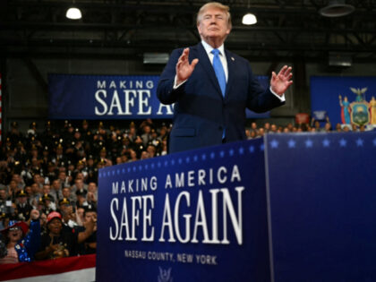 US President Donald Trump arrives to deliver remarks at the Nassau County Police Academy C