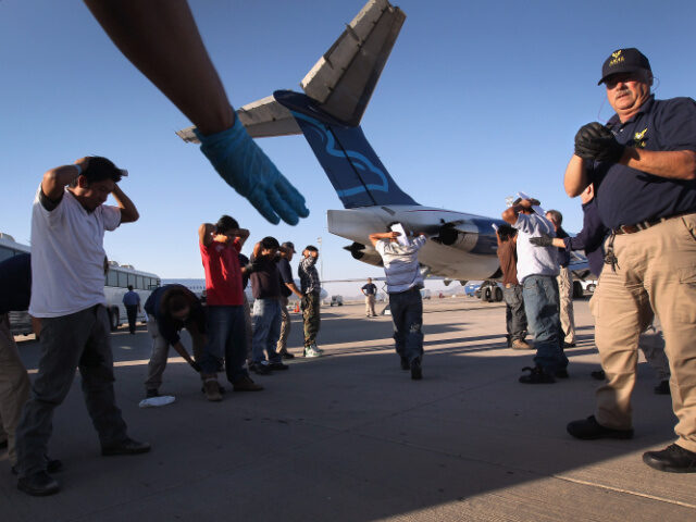 Undocumented deportations Undocumented Guatemalan immigrants are body searched before boarding a deportation flight