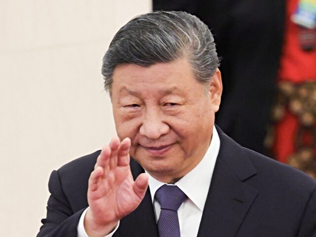 Xi Jinping China’s President Xi Jinping waves as he attends a welcoming ceremony for Tonga's King T