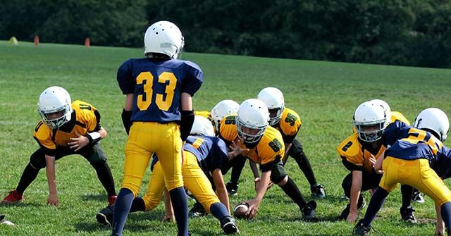 WATCH: Football Dad, 41, Trips Player, 9, Preventing Him from a Touchdown