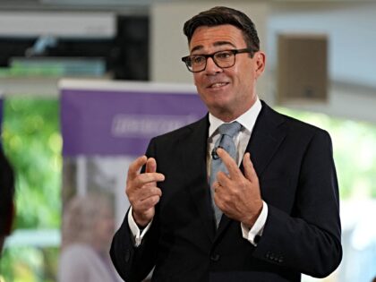 Britain's Prime Minister Andy Burnham delivers a speech as he visits social care organisat
