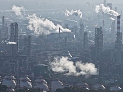 NANJING, CHINA - NOVEMBER 26, 2025 - Chimneys in a petrochemical company's factory area al