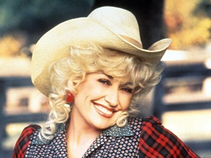 Dolly Parton in publicity portrait for the film 'Rhinestone', 1984. (Photo by 20th Century