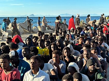 CEUTA, SPAIN - AUGUST 03: The Red Cross and the Sur Sur organisation are distributing basi