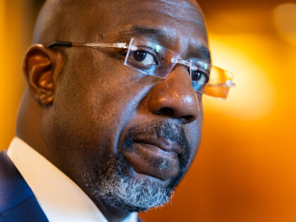 WASHINGTON, DC - JULY 13: U.S. Sen. Raphael Warnock (D-GA) departs from the Senate Chamber