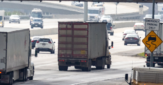 WATCH — New York: Trucker's Big Rig Smashes into Highway Overpass and Tips Over