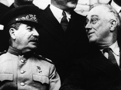 Stalin And Roosevelt At Tehran (Photo by © Hulton-Deutsch Collection/CORBIS/Corbis via Ge