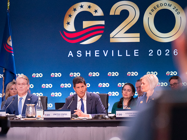 Secretary of Treasury Scott Bessent (left) and Federal Reserve Chairman Kevin Warsh speak