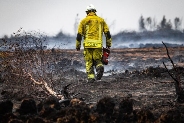 Firefighters worked all night to fully surround the fire, coming in from the east and nort