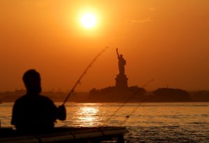 Boat capsizes in N.Y. Harbor, killing mother and baby