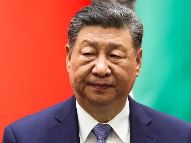  China's President Xi Jinping looks on during a signing cerem