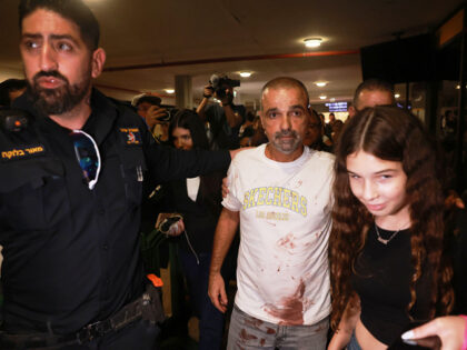 Israeli passenger Yaniv Hayoun, with blood stains on his shirt, who was aboard a Flydubai