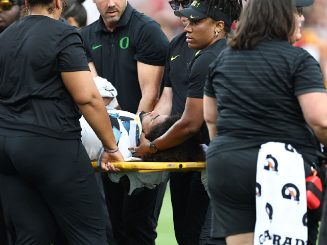 WATCH: USC Player Smiles on Sideline After Illegal Hit that Sent Oregon QB to the Hospital