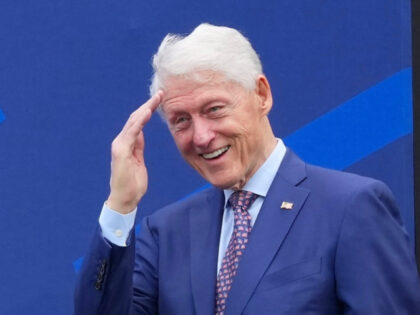 Former President Bill Clinton and former Secretary of State Hillary Clinton are introduced