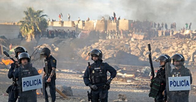 Watch: Spanish Police Fire Warning Shots During Growing Tensions Outside Ceuta Migrant Shelter