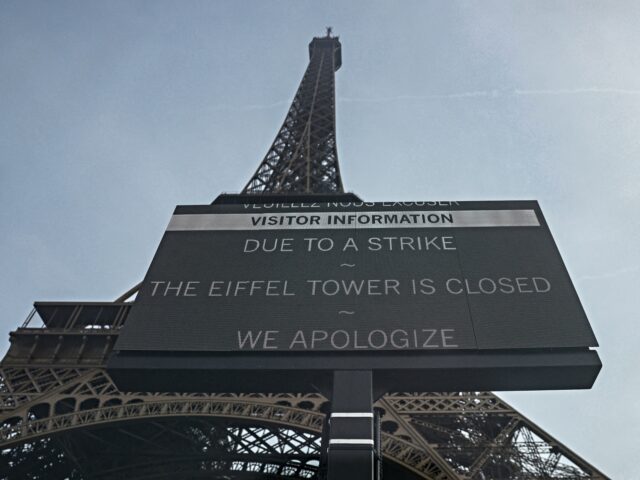 Eiffel Tower closed This photograph shows a view of a placard reading "Due to a strike the Eiffel Tower is clo