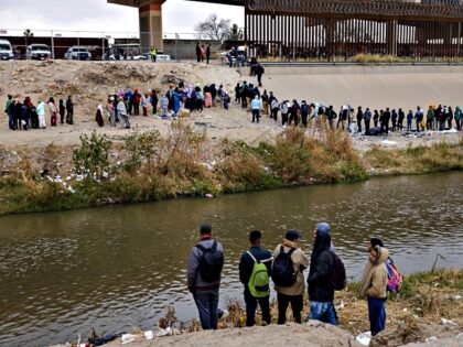 CIUDAD JUAREZ , MEXICO - DECEMBER 21: Migrants from Latin America wait at the southern bor