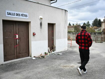 A man walks past the reception hall in Crepol, southeastern France on November 22, 2023, w