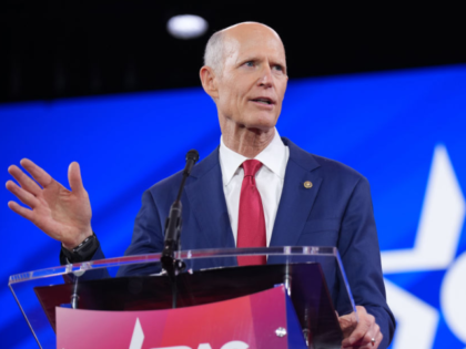 OXON HILL, MARYLAND - FEBRUARY 20: U.S. Sen. Rick Scott (R-FL) speaks at the Conservative
