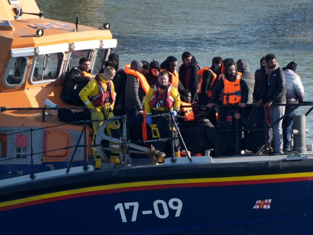 A group of people thought to be migrants are brought in to Ramsgate, Kent, onboard the RNL