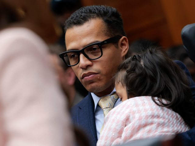 GettyImages-2264768259 WASHINGTON, DC - MARCH 04: Dalilah Coleman (R) and her father, Marcus Coleman, look on as