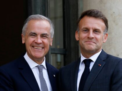 PARIS, FRANCE - JUNE 12: Canadian Prime Minister Mark Carney (L) is welcomed by France's P
