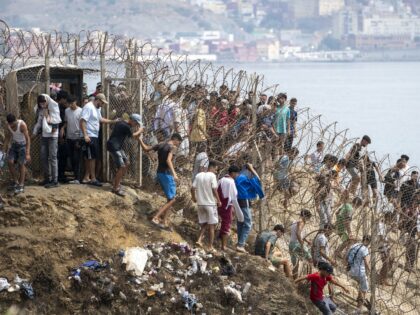 CEUTA, SPAIN - JULY 31: Undocumented migrants, mostly young men, who entered Spain's North