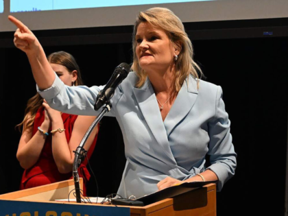 Kansas state Sen. Cindy Holscher, D-Overland Park, speaks to a crowd of supporters at a wa