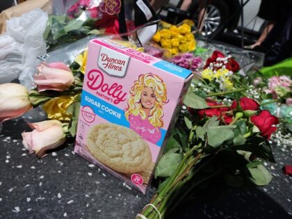 Flowers and remembrances are laid on Dolly Parton's Star on the Hollywood Walk of Fame on