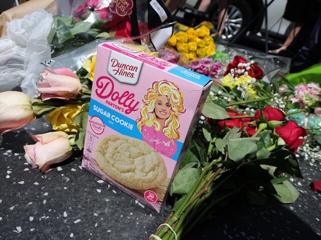 Flowers and remembrances are laid on Dolly Parton's Star on the Hollywood Walk of Fame on