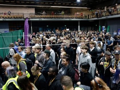 Participants queue inside a shelter during the Shelter 2026 civil emergency and defence ex