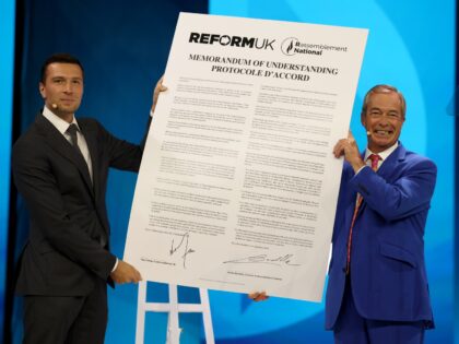 BIRMINGHAM, ENGLAND - SEPTEMBER 04: Reform UK Party Leader Nigel Farage (R) joins Jordan B