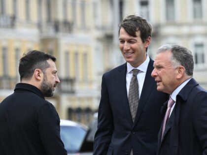 Ukraine's President Volodymyr Zelensky (L) welcomes US Special Envoys Steve Witkoff (R) an