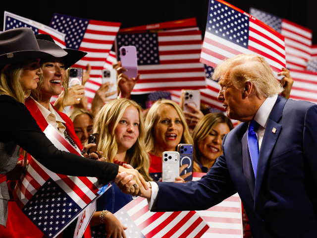GettyImages-2294419001 DALLAS, TEXAS - SEPTEMBER 09: U.S. President Donald Trump greets attendees as he walks on