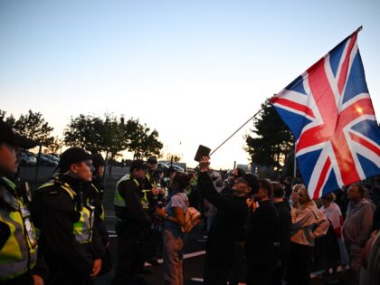 GOSPORT, ENGLAND - SEPTEMBER 22: Anti-migrant demonstrators gather on September 22, 2026 i