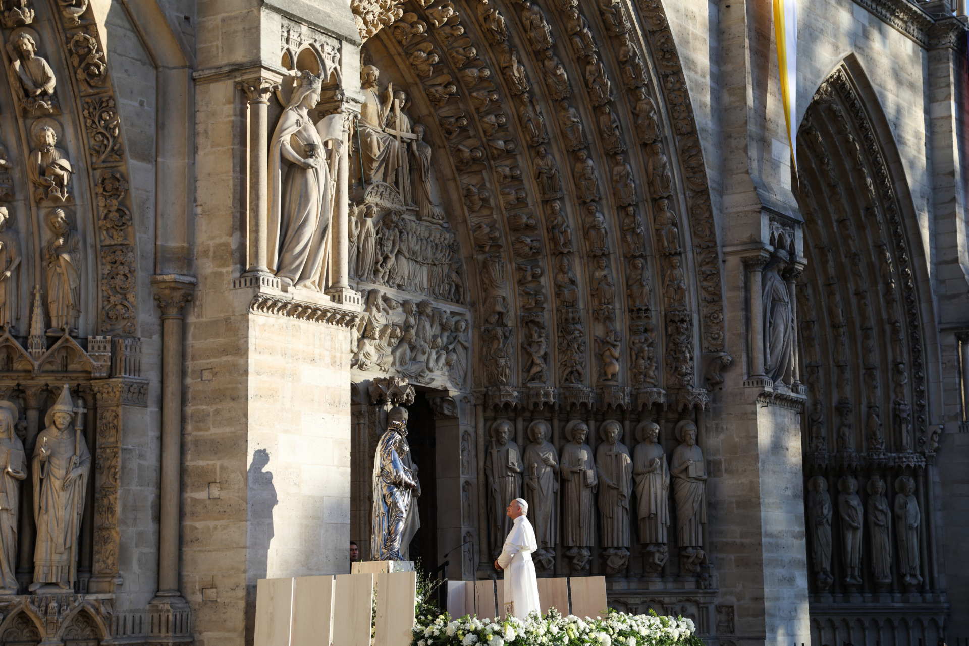 Pope Leo XIV prays in front of the silver Virgin and Child (Vierge à l'Enfant) from the Notre-Dame de Paris treasury, known as the "Vierge dite de Charles X", after presiding the Solemn Vespers at Notre-Dame Cathedral in Paris on September 25, 2026 as part of his four days visit to France. (Photo by Kenzo TRIBOUILLARD / AFP via Getty Images)