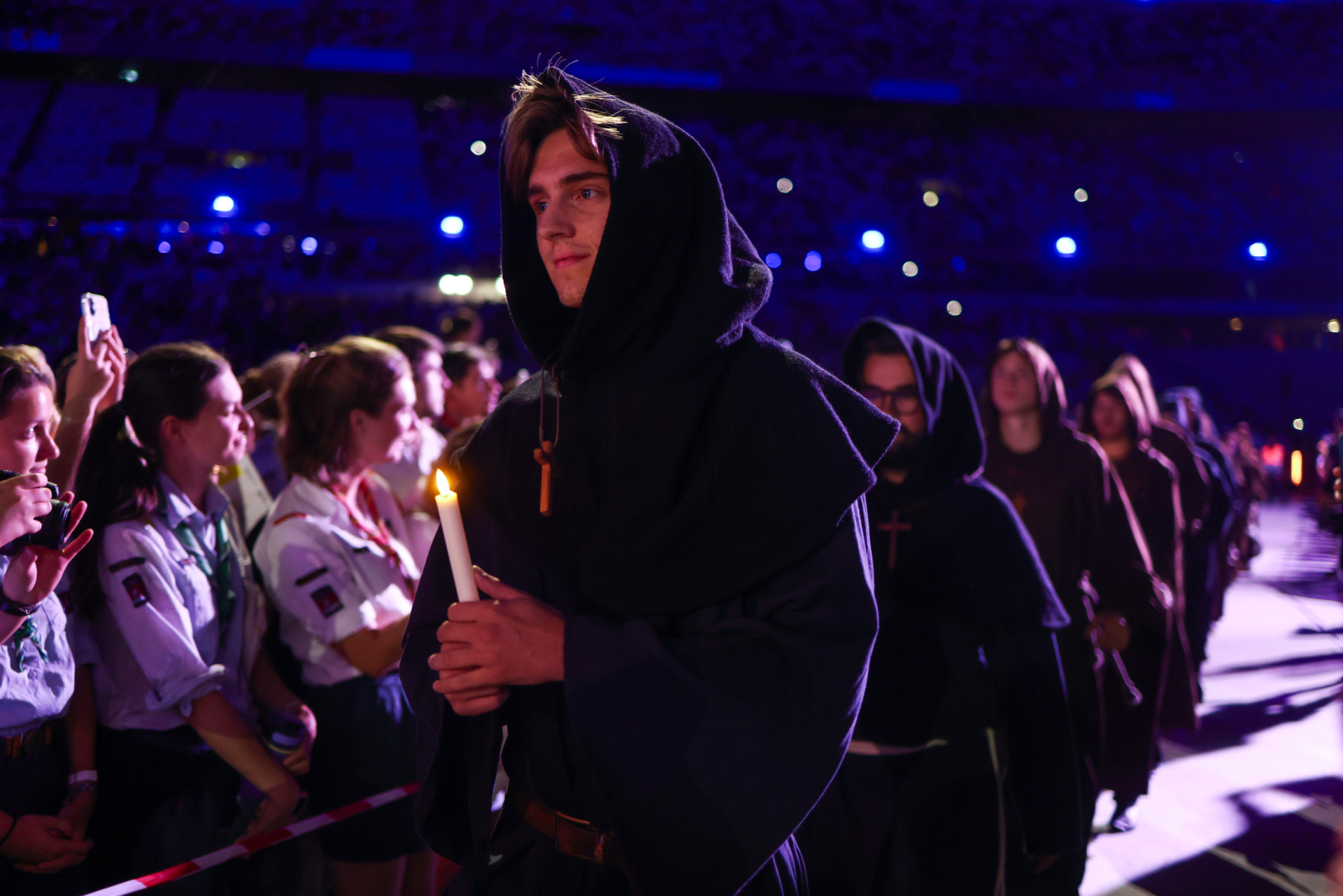 Faithful take part in a theatrical performance in ten scenes depicting French saints and virtues during a prayer vigil with young people at the Stade de France on September 25 in Saint-Denis, a northern suburb of Paris, France. Pope Leo XIV is making his first official visit to France from September 25-28 with stops in Paris, Lourdes, and Metz. While in Paris, the pontiff's agenda includes a meeting with French President Emmanuel Macron, a prayer service at Notre-Dame Cathedral, and an open-air mass along the Champs-Élysées, among other engagements. The trip marks the first papal visit to the European country since Benedict XVI visited in 2008. (Photo by Tom Nicholson/Getty Images)