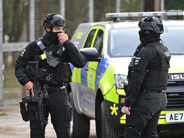 FAIRFORD, ENGLAND - SEPTEMBER 28: Armed police maintain road blocks and security checks ar