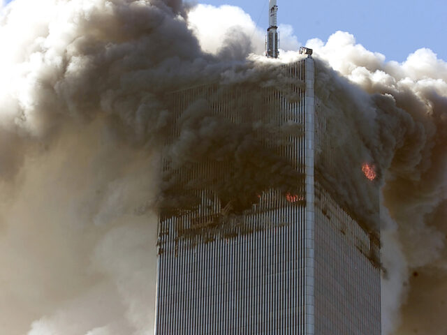 394263 14: (PUERTO RICO OUT) (FILE PHOTO) The north tower of the World Trade Center burns